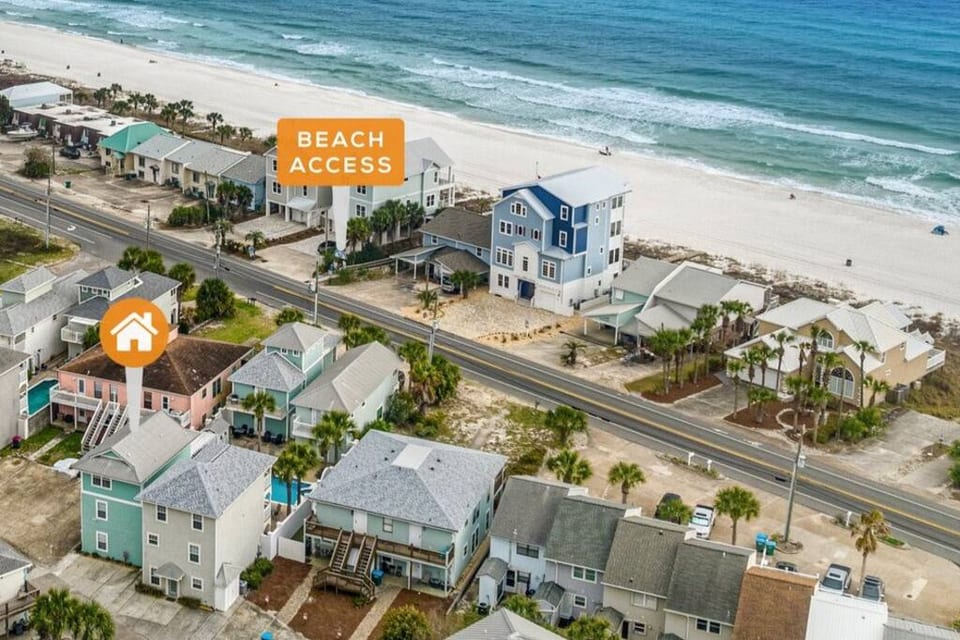 Simply walk by the pool and between the 2 front houses and you are at the beach access light! Simple!