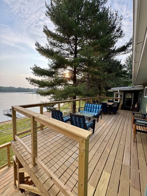 Oversized deck off of the porch and kitchen is the perfect spot to take in the peaceful views.