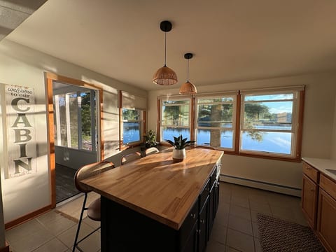 Surrounded by windows, the kitchen offers views for days.