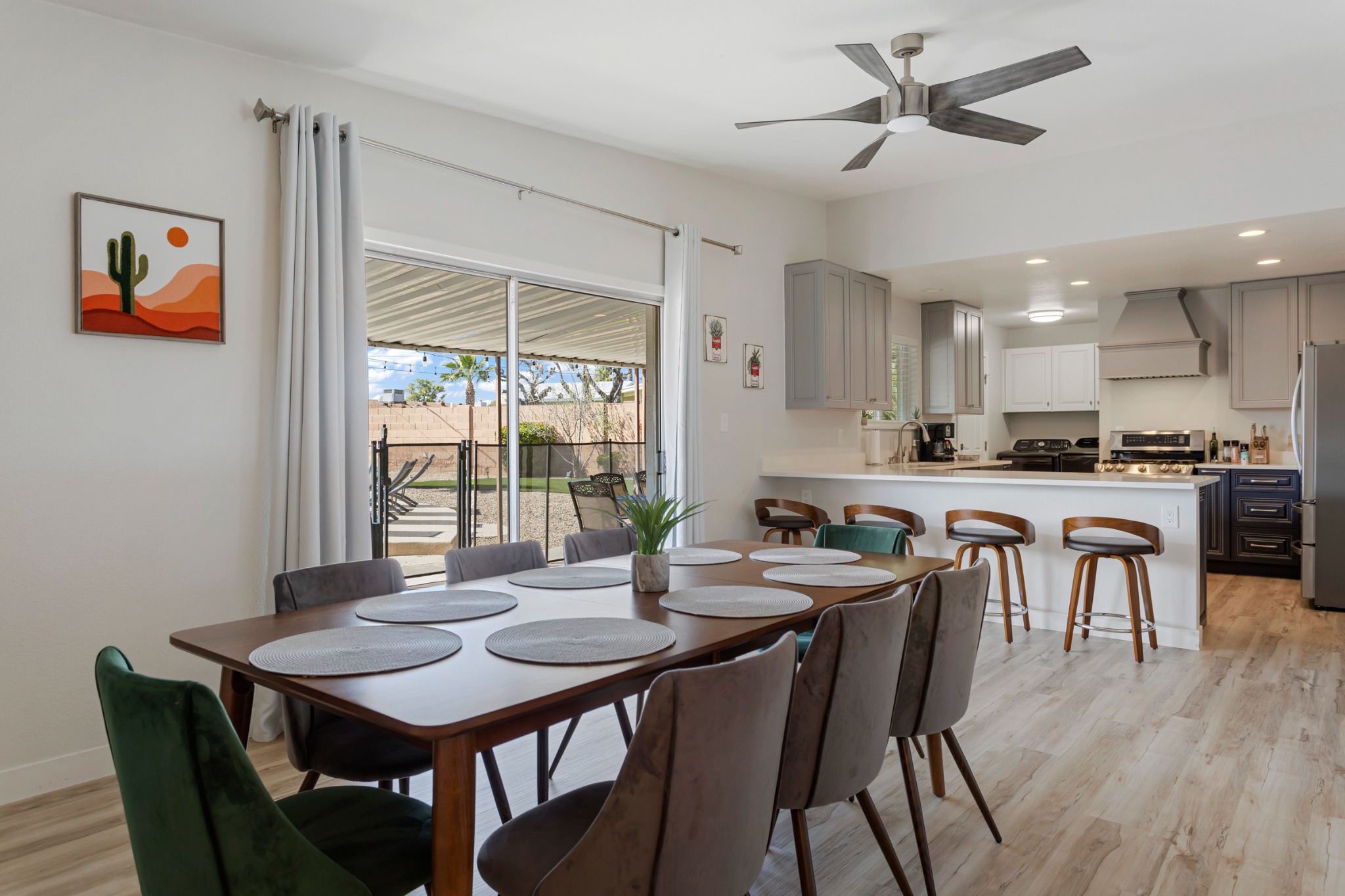 Large dining room with table - Seating for 8 & Seating for 4 at the breakfast bar. - Tempe's Mid Mod Desert Oasis - Tempe