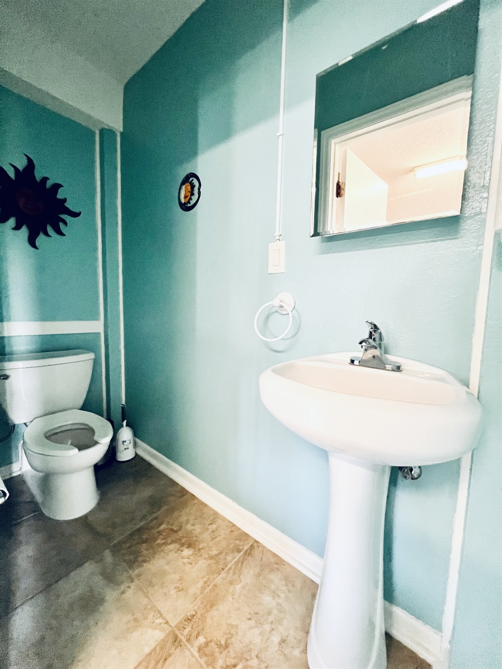 Half Bathroom Ground Floor off Game Room, next to bonus Queen Bedroom