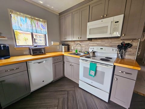 Window provides extra light in fully equipped kitchen with several additional small appliances including your own ice maker.