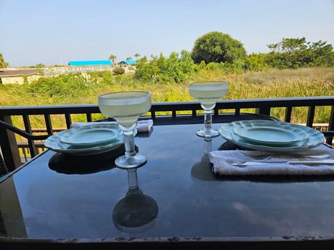 Step outside to the balcony and enjoy your meals at the hightop table.   With peeks of the Ocean, a fabulous Ocean breeze, and the wildlife frolicking directly in front of your balcony, you are sure to enjoy every meal!