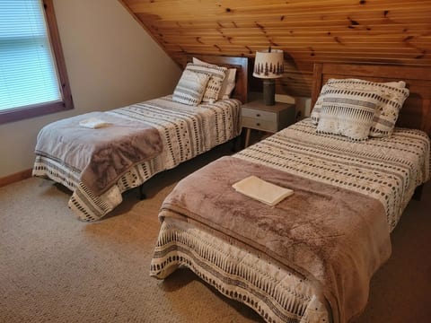 Twin beds in the loft