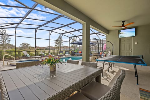 Dining and ping pong covered Patio area