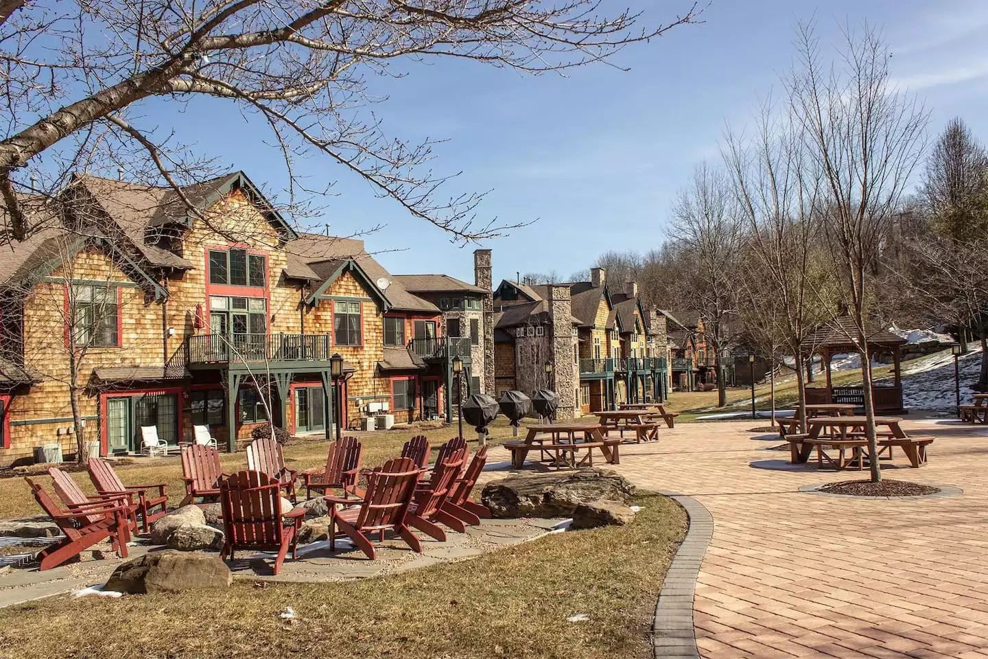 Fire pit, picnic tables, a gazebo, and BBQ grills open in the summer