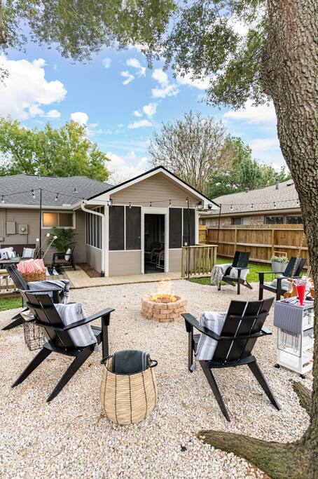 Soak in the ambiance of outdoor seating, a warm fire, and flourishing greenery