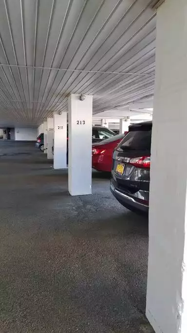 2 parking spaces under building - clearance of 7ft will accommodate larger SUV's - Rehoboth Beach Condo w/ Ocean views! - Rehoboth Beach