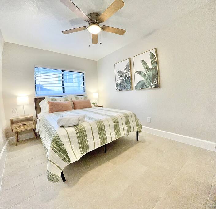 Relax in this spacious, airy bedroom with a ceiling fan, window and a tranquil atmosphere - 4BR Family Oasis | Prime Location, Fast Wi-Fi-TCF - Converse