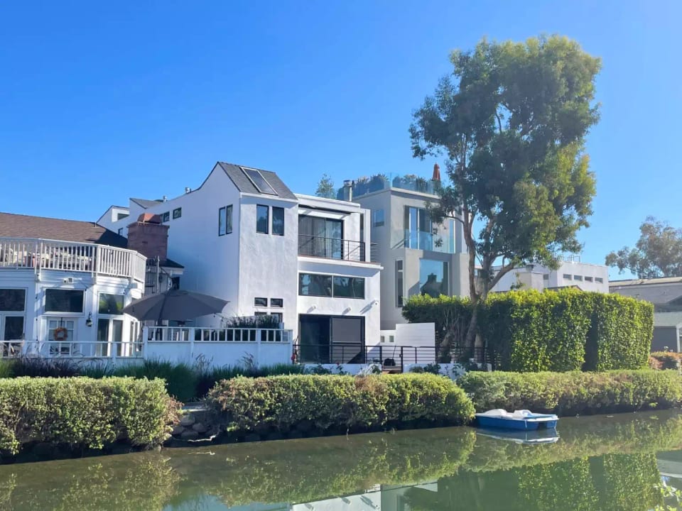 Front of home, on canal