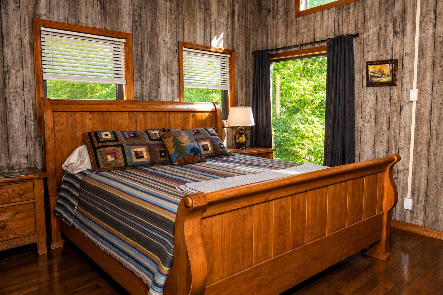 Upstairs bedroom w/picture window (king bed and futon)