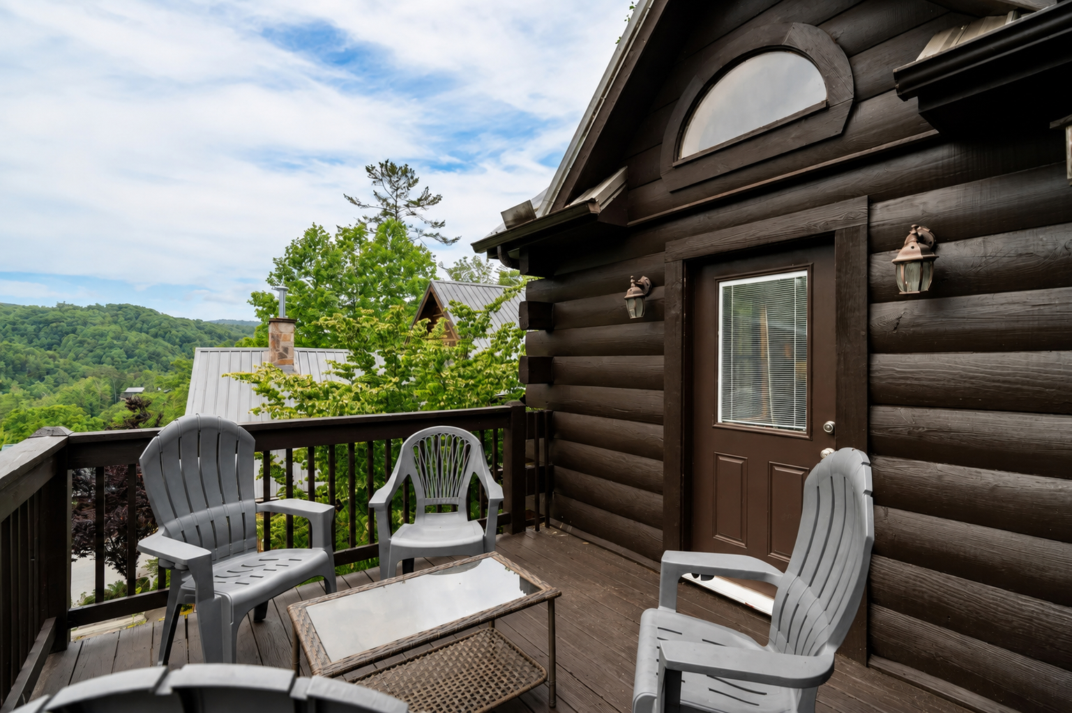Step outside and relax on the private deck while taking in the peaceful mountain view.