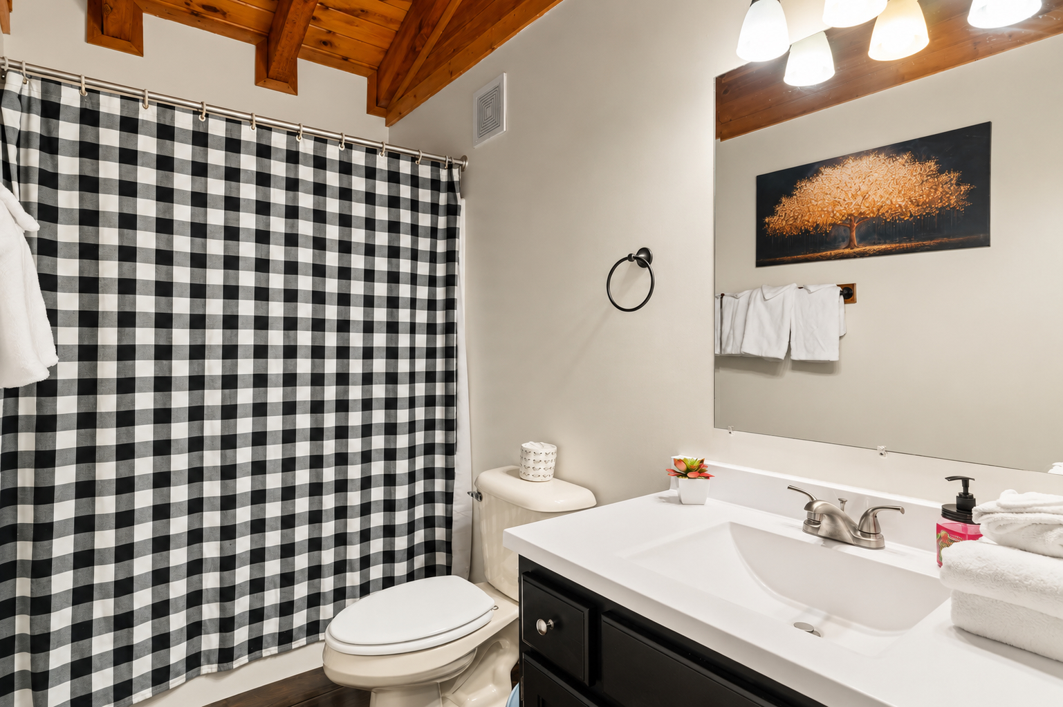 A full bathroom just off the loft keeps everything convenient for your upstairs guests.