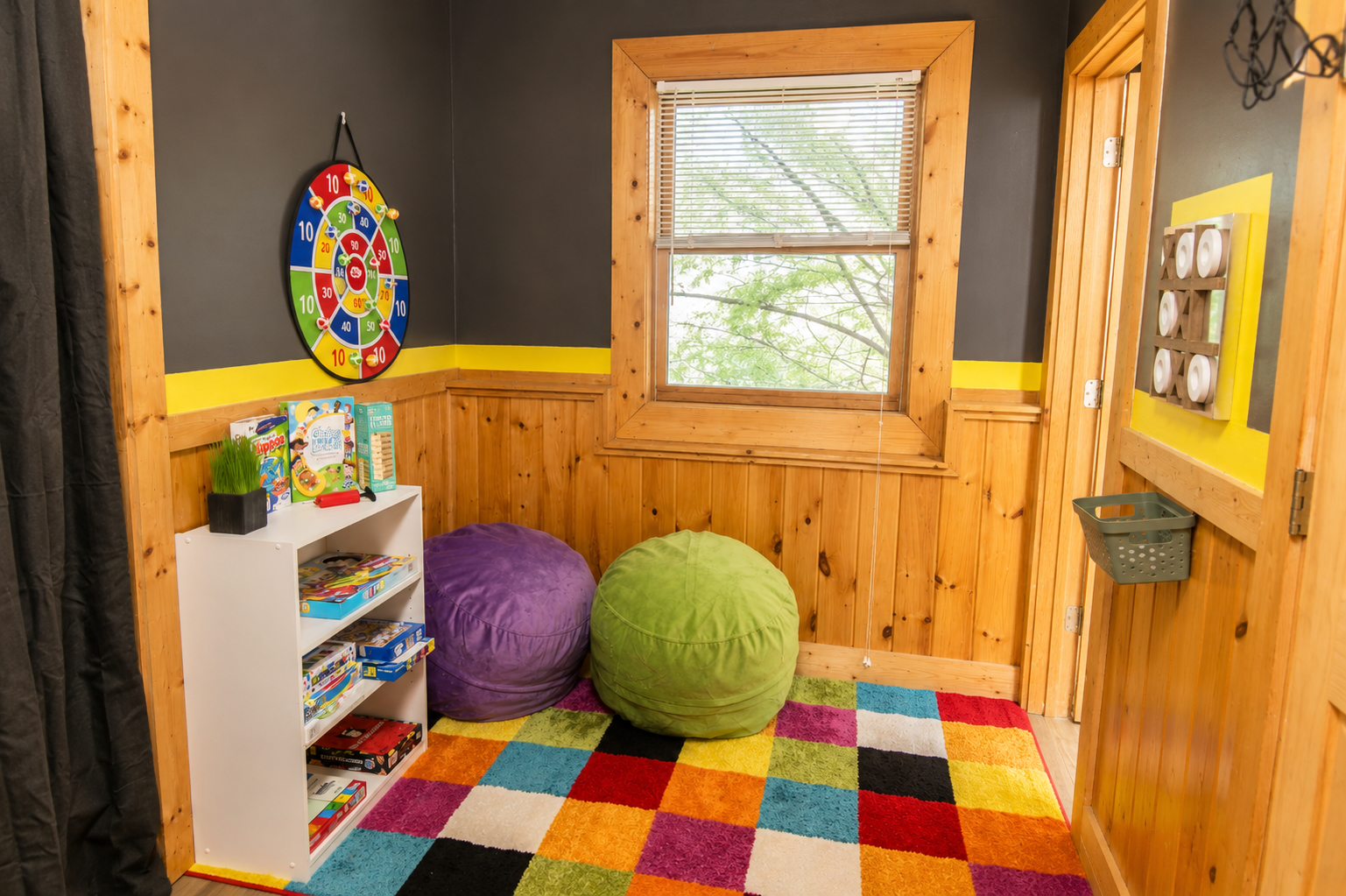 A colorful kids’ corner with board games, comfy beanbags, and plenty of room for family fun.