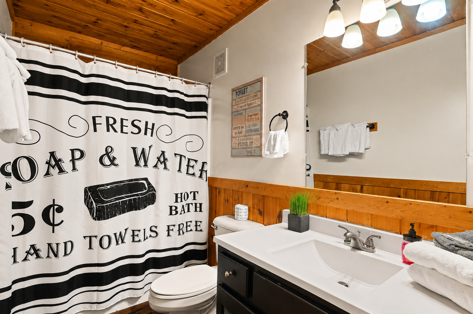 A convenient full bathroom on the main level keeps mornings and evenings easy for your group.
