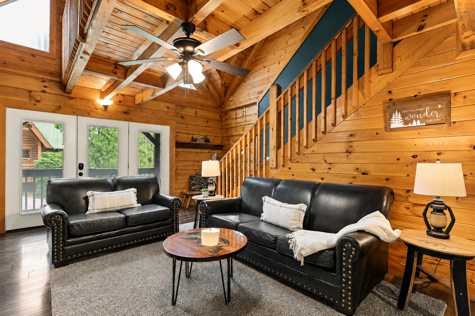 Kick back and relax in the cozy great room, with soaring wood ceilings and plenty of comfortable seating for everyone.