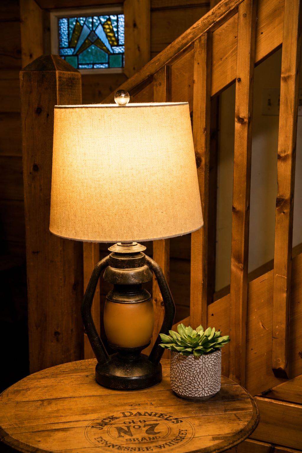 Thoughtful cabin touches and warm lighting create a cozy Smoky Mountain atmosphere throughout