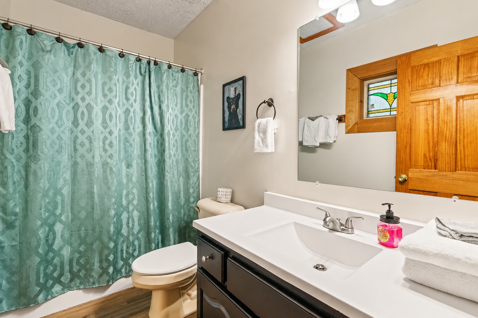 A convenient lower-level full bathroom makes it easy for everyone to refresh and recharge.
