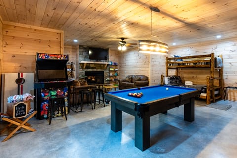 Our basement game room has a pool table, Smart TV, and 4-player arcade with over 4,000 games.