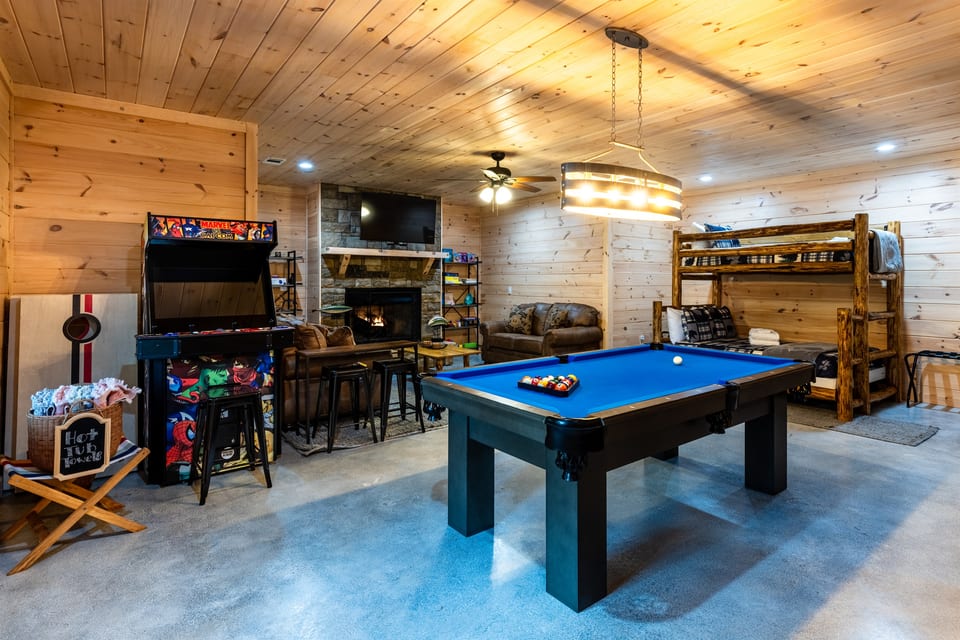 Our basement game room has a pool table, Smart TV, and 4-player arcade with over 4,000 games.