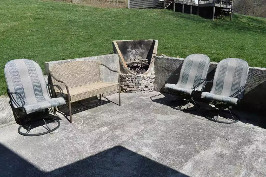 back porch with open fireplace and views of pond back porch with open fireplace and views of pond - Raystown Farmhouse, <1mile to boat access. AC/wifi - James Creek