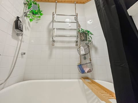How about a bubble bath accompanied by candles and a glass of your favorite drink? The bathtub fits  1-2 adults.