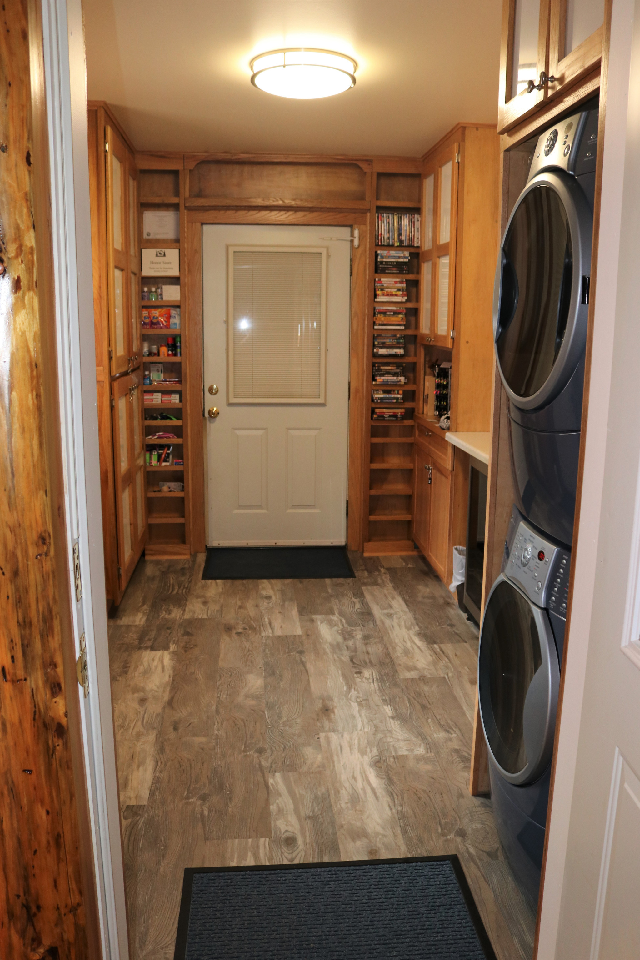 Shared Laundry room with Washer/Dryer, dvd library and small honor store