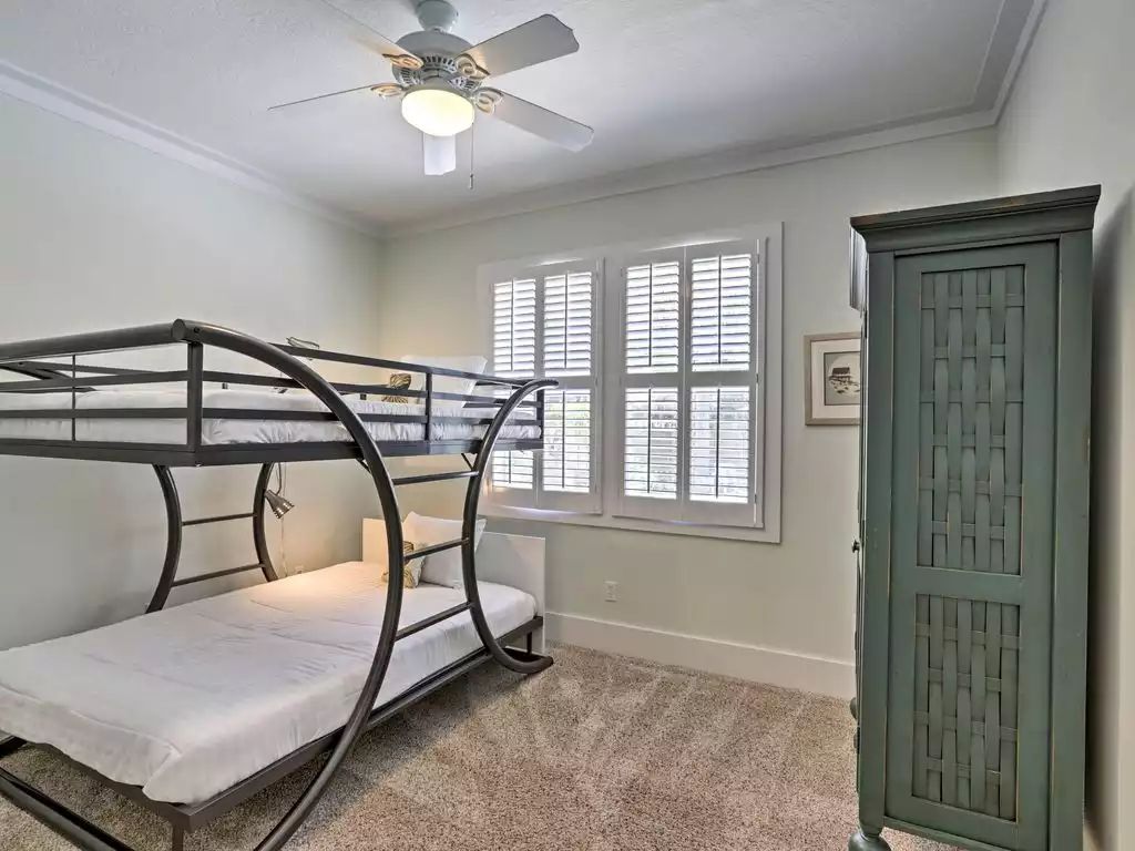 This bedroom hosts a full-over-full bunk bed. - 5 Bd sleeps 14 Heated Pool, Hot Tub & Golf Cart - Santa Rosa Beach