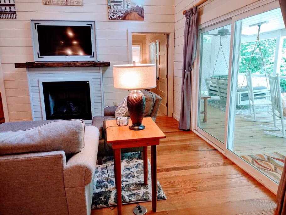 sliding glass door leads to huge covered porch overlooking creek sliding glass door leads to huge covered porch overlooking creek - Modern Farmhouse on Creek near Town/Train +Hot Tub - 28713