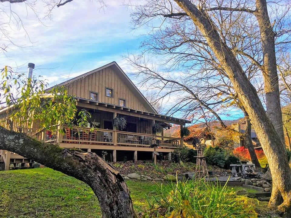 Extremely magical and peaceful backyard - a serene outdoor space surrounded by nature, perfect for relaxing, unwinding, and enjoying the Smoky Mountain scenery.
