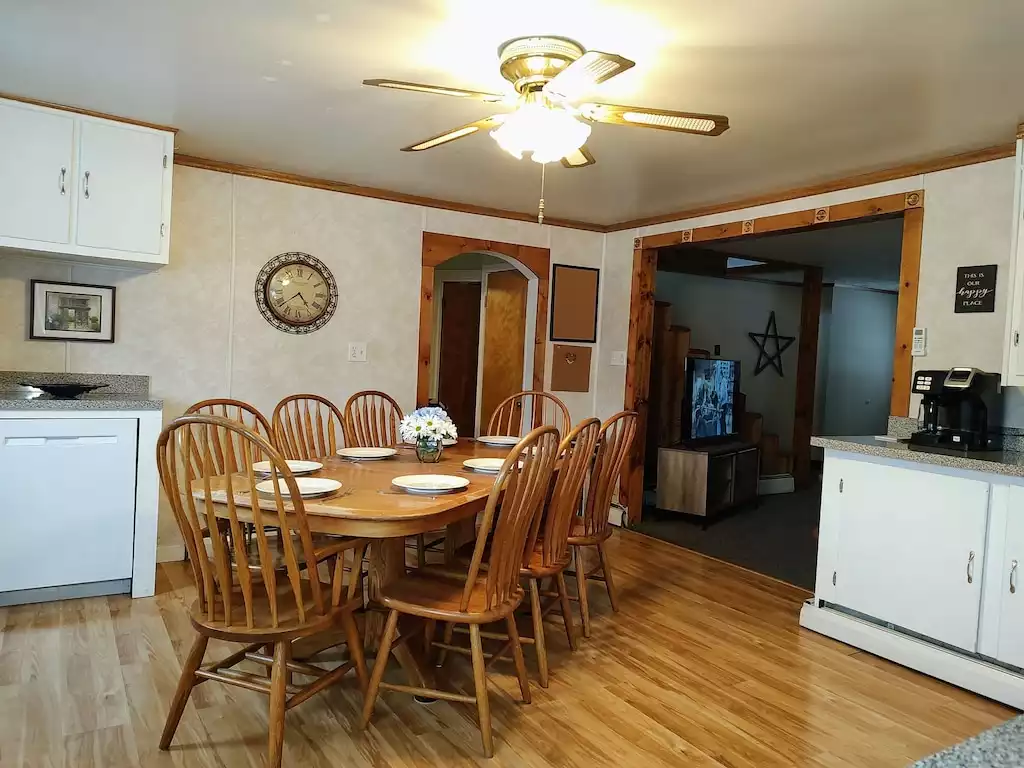 Kitchen - Table seating for 8. - Peaceful Acres Vacation Rental - Hesston