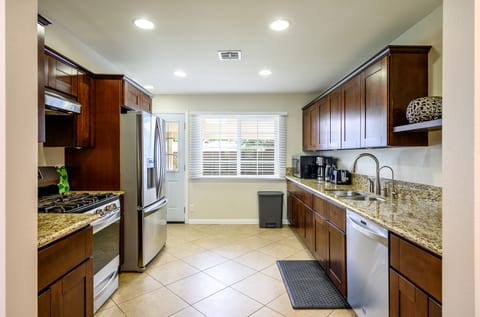 Spacious house has two master bedrooms & king beds