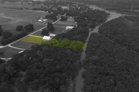 Immerse Yourself in Serenity: A Bird's Eye View of our Riverside Retreat on the Banks of the Brazos River