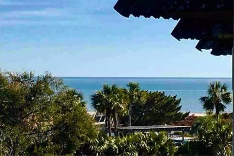 Panoramic Marsh & Ocean views from our covered patio!
Straight ahead and to the left, enjoy serene Lowcountry Marsh views!
Ocean view is to the right—you can see the waves depending upon tides!
Marsh NOT noisy parking lot below!