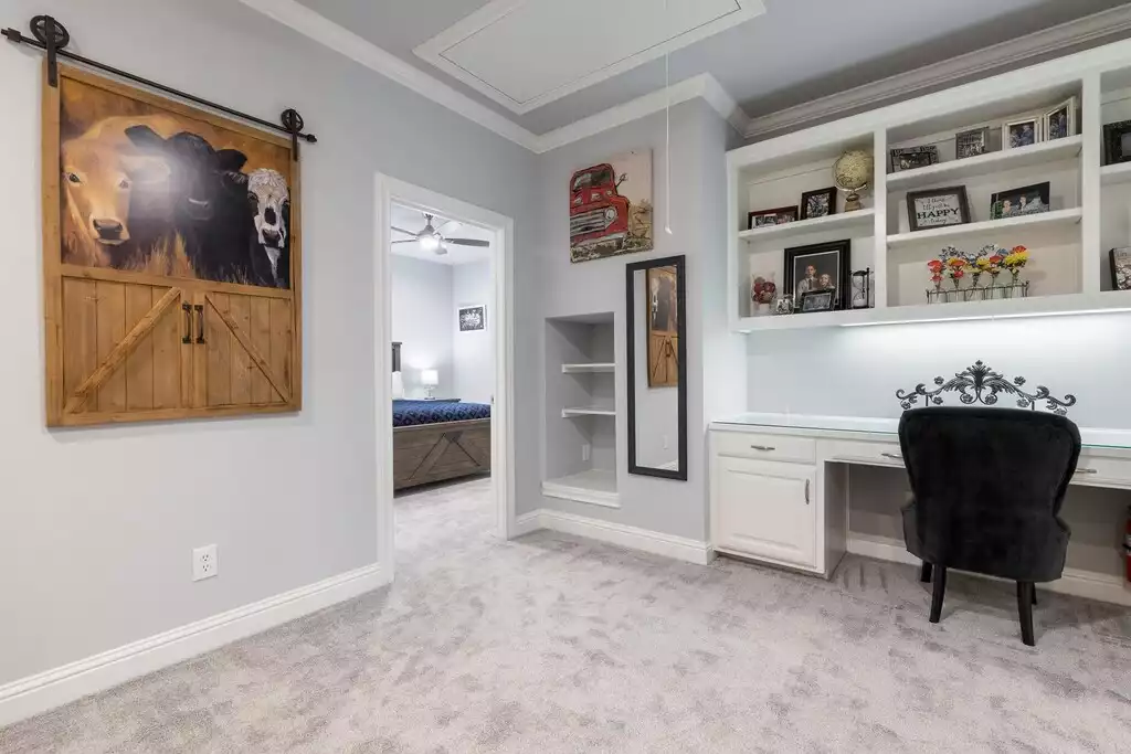 The upstairs bonus room has a work station and access to four bedrooms. The upstairs bonus room has a work station and access to four bedrooms. - Main House at Whispering Oaks Estate - Dripping Springs