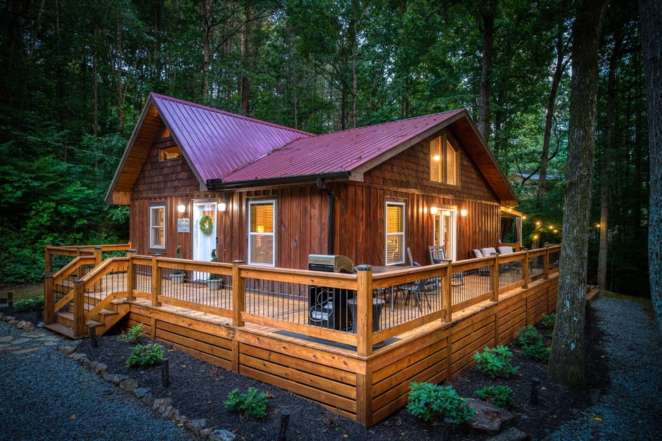 The outdoor living space is a tranquil oasis, perfect for simply enjoying the fresh air or a sunset. It features comfortable seating for a great place to relax and unwind.