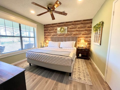 You’ll love this King size Sleep Number Bed in the primary bedroom. The 50” Smart TV comes with free Netflix, HBOMAX, and PrimeVideo. The two bedside lamps have USB ports. A hanging cubby organizer is in the closet along with xtra pillows/blankets