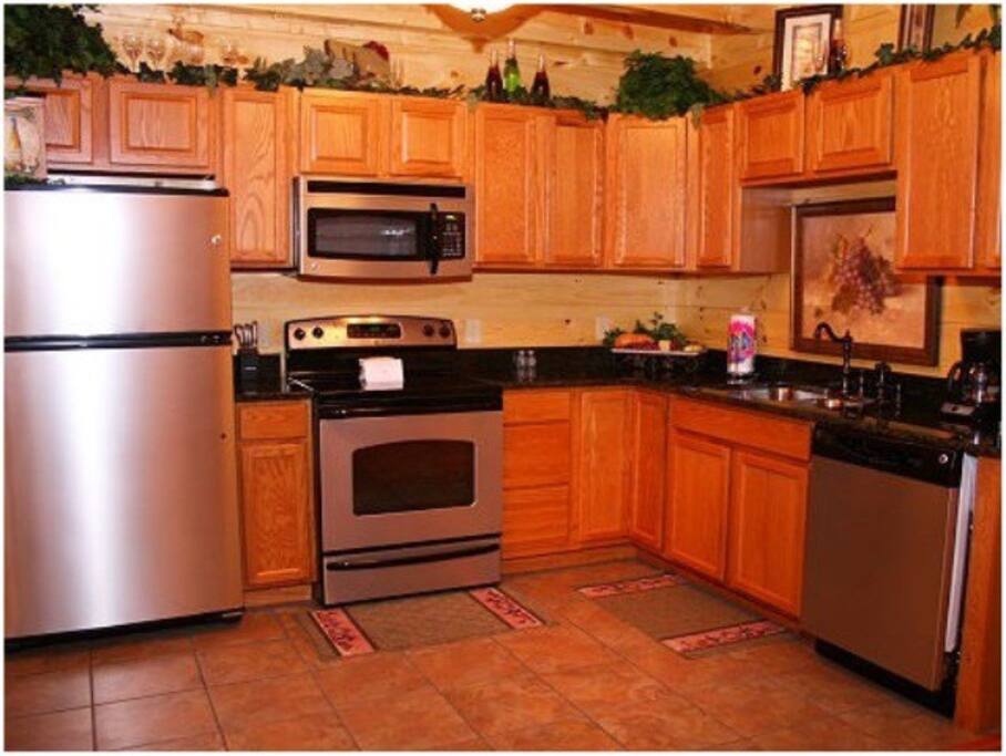 Kitchen with Stainless Steel Appliances, a Keurig, slow cooker, and more.