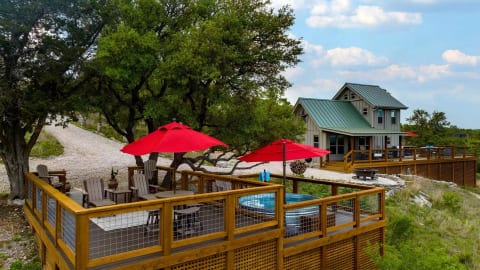 View of the decks and cabin on 57 acres