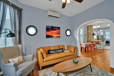 Beautiful leather sofa and wing back arm chairs in the living area