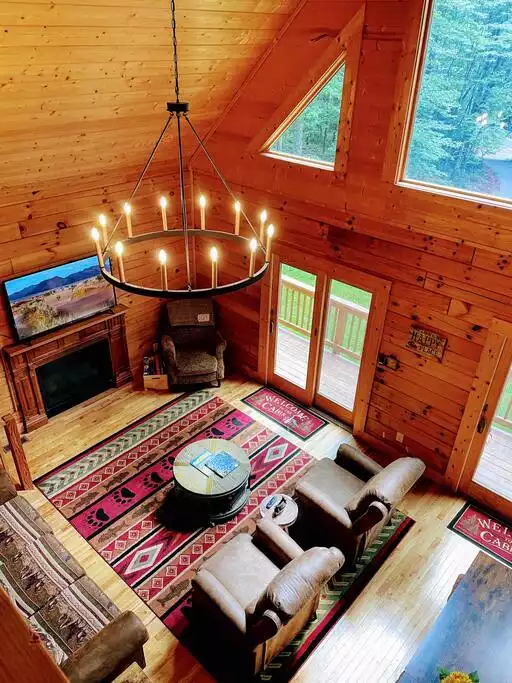 View from the loft. Gather by the fireplace to chat, read magazines about things to do in the area, watch movies or, play the many board games available. View from the loft. Gather by the fireplace to chat, read magazines about things to do in the area, watch movies or, play the many board games available. - The Blue Ridge Cabin - Roseland