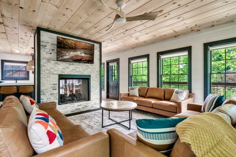 Our living room is designed to provide comfort and reprieve while looking out into the natural beauty of the Smoky Mountains. Enjoy an early morning coffee on our deck, equipped with 6 rocking chairs