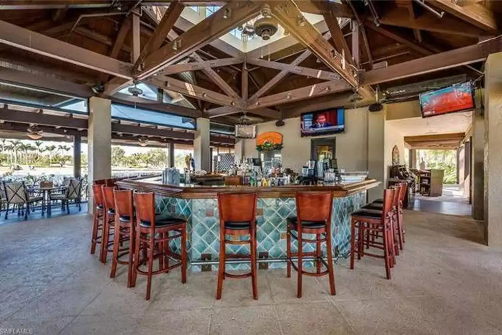 Relax at the poolside bar and grill when visiting the clubhouse