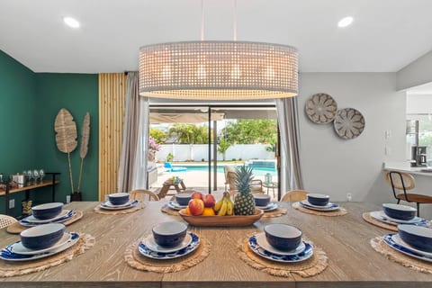 A dining table, capable of accommodating up to 10 guests, takes center stage, beckoning family reunions and memorable gatherings with friends.
