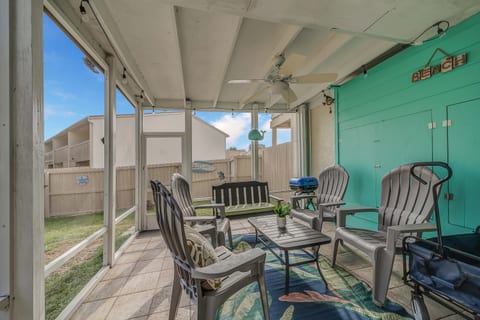Morning Coffee or Evening Game Night – Screened-in, bug free comfort.