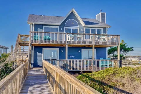 Soak in the hot tub or lounge on the outdoor furniture while you watch for dolphins.