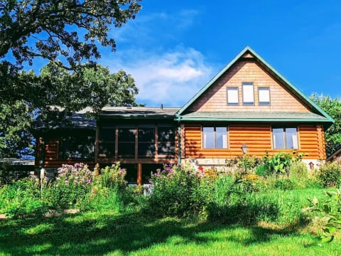 Perennial garden attracts birds and butterflies. Veggie garden for picking!
