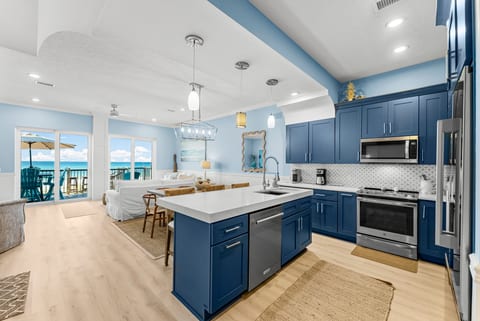 Fully equipped kitchen: granite counters, stainless appliances, plus a wine cooler/ice-maker & kitchenette. Dining room and breakfast bar seat 10 comfortably