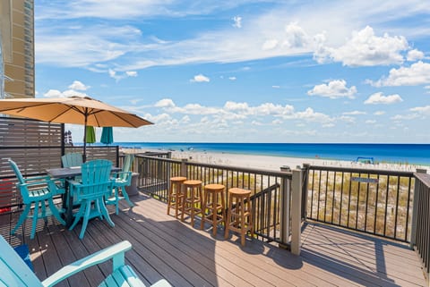 Step outside and breathe in that salty air — beach access just steps away