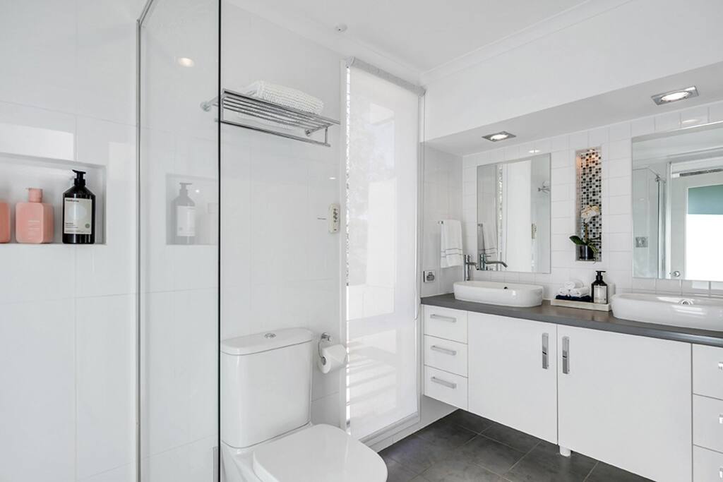 Sparkling ensuite bathroom upstairs servicing Bedroom 1, with dual vanities and luxurious rain shower. - Perfect Adelaide Escape-15 mins to City & Wineries - Adelaide South Australia